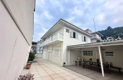 Casa em condomínio fechado com 5 quartos à venda na rua papa joão xxiii, coqueiros, florianópolis, 320 m2 por r$ 2.350.000