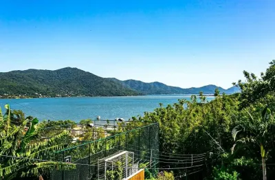 Casa em condomínio fechado com 5 quartos à venda na servidão caminho do pescador, lagoa da conceição, florianópolis, 400 m2 por r$ 4.000.000