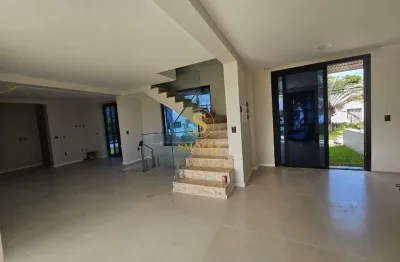 Casa em condomínio fechado com 3 quartos à venda na rua das piraúnas, jurerê, florianópolis, 222 m2 por r$ 3.800.000