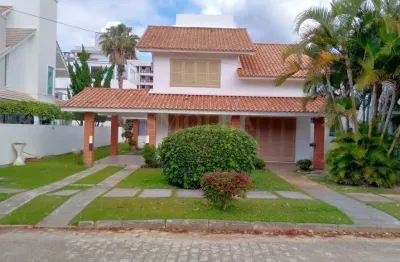 Casa em condomínio fechado com 5 quartos à venda na rua das tainhas, jurerê internacional, florianópolis, 300 m2 por r$ 3.500.000