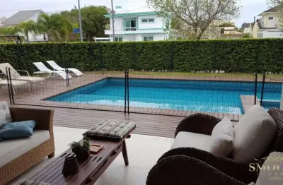 Casa em condomínio fechado com 6 quartos à venda na rua dos camuris, jurerê internacional, florianópolis, 495 m2 por r$ 6.500.000