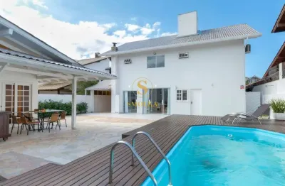 Casa em condomínio fechado com 5 quartos para alugar na Rua dos Amborés, Jurerê Internacional, Florianópolis, 192 m2 por R$ 19.000