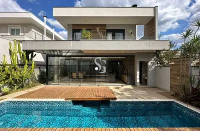 Sobrado de luxo no swiss park - campinas: 4 suítes, espaço gourmet, piscina com deck deslizante, tecnologia e conforto.