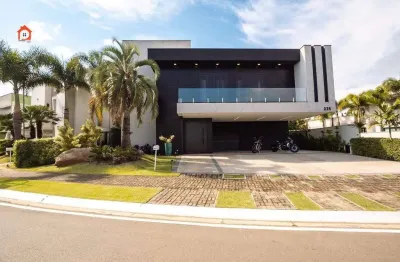 Venda - maison du parc: sofisticação em 551m² de terreno e 418m² construídos com 4 suítes, cinema e sauna
