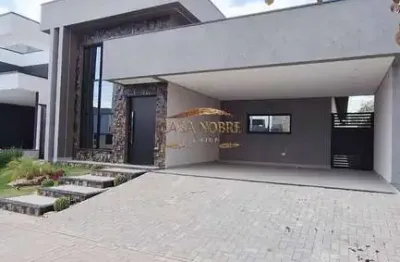 Casa em condomínio fechado com 3 dormitórios e lazer completo