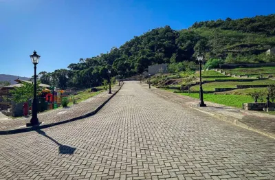 Lote em condomínio fechado para venda em itapema, casa branca