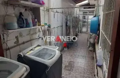 Casa com 2 dormitórios à venda por r$ 450.000,00 - tupi - praia grande/sp