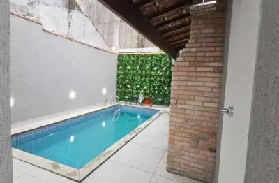 Casa com 2 dormitórios à venda por r$ 680.000,00 - mirim - praia grande/sp