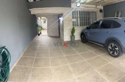 Casa com 2 dormitórios à venda, 125 m² por R$ 615.000,00 - Caiçara - Praia Grande/SP