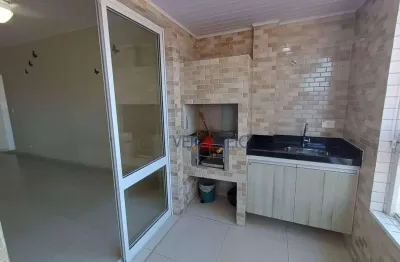 Apartamento com 2 dormitórios à venda, 75 m² por R$ 570.000 - Vila Guilhermina - Praia Grande/SP