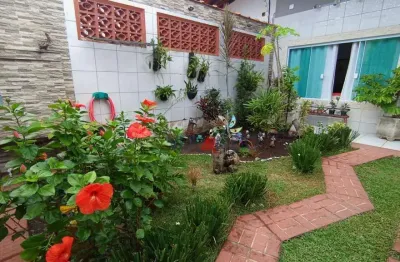 Casa com 2 dormitórios à venda por R$ 650.000 - Tupi - Praia Grande/SP