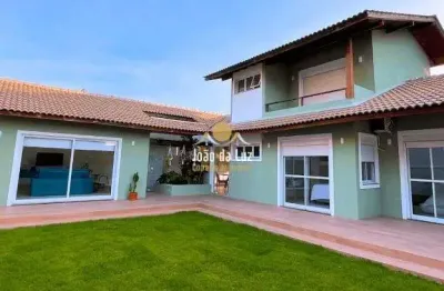 Casa em condomínio fechado com 3 quartos à venda no cachoeira do bom jesus, florianópolis  por r$ 1.697.000