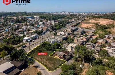 Área à venda de frente para av. jones dos santos neves com 2.598 m2, principal entrada da cidade de guarapari. condição super facilitada de pagamento!