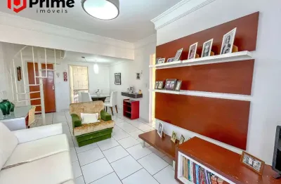 Cobertura à venda na quadra da praia de peracanga, 2 quartos, suíte, rooftop com vista livre e vaga de garagem.