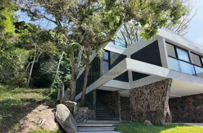 Casa em condomínio à venda em canasvieiras florianópolis 3 suítes 310 m²