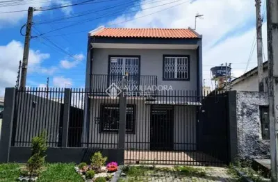Casa com 3 quartos à venda na Avenida Perdizes, 293, Gralha Azul, Fazenda Rio Grande, 70 m2 por R$ 499.900