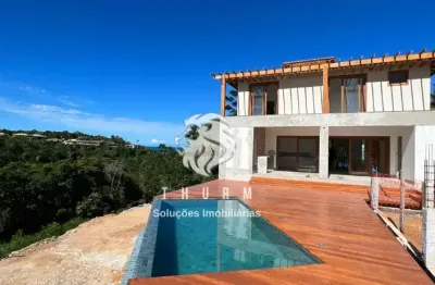 Casa a venda em arraial d' ajuda com 4 suítes e vista para o mar