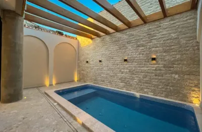 Belíssima casa com piscina 3 suítes no canto do forte
