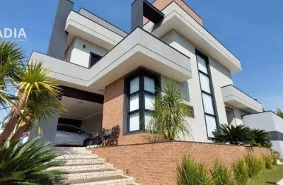 Casa com 4 dormitórios, 325 m² - venda por r$ 2.890.000,00 ou aluguel por r$ 13.593,83 - condomínio terras do cancioneiro - paulínia/sp