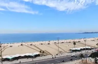 Apartamento frontal  mar em andar alto com vista total da praia de copacabana