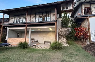 Casa contemporânea em condomínio fechado com uma linda vista das montanhas