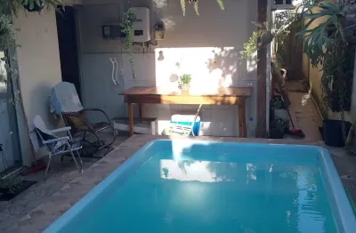 Casa com piscina no bairro los angeles – barra velha