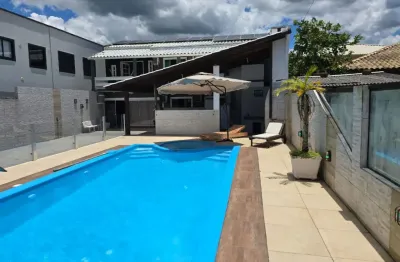 Casa espetacular a 50 metros do mar – enseada da pinheira   valor: r$ 1.800.000  escritura pública  400m² de área construída | amplo terreno