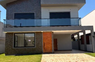 Casa de alto padrão no condomínio alvorada. com 3 quartos sendo suites