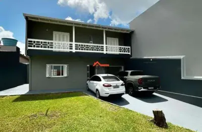 Belo sobrado de 3 dormitórios com 1 suíte e 212m2 construídos na av. joão paulo i, 422 - santo inácio - esteio