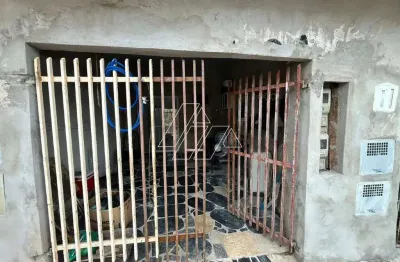 Imóvel com sala cozinha 1 wc social, área de serviço, 1 dormitório e 1 vaga de garagem.