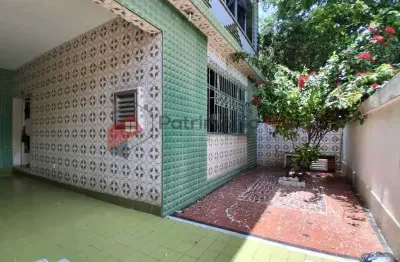 Casa em Jardim América com 3 quartos, 2 vagas de garagem e churrasqueira