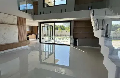 Residência de luxo em condomínio com 3 suítes e 4 vagas em tamboré jaguariúna-sp: um sonho à venda!