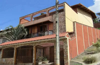 Casa com 4 quartos à venda na Rua Wilson Mostaro Júnior, Nova Era, Juiz de Fora