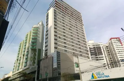 Centro • 2 quartos (2 suítes) • varanda • vaga • condomínio com lazer