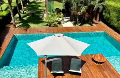 Casa  pé na areia em guarajuba, casa de luxo em condomínio paraíso  à venda em guarajuba, camaçari-ba: 5 quartos, 5 suítes, 3 salas, 355m² de área.