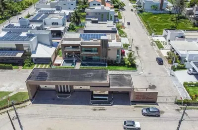 Casa de alto padrão com 4 suítes com piscina e rooftop à venda no cond. ilha da lagoa