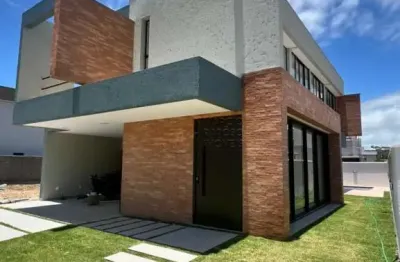Casa com 4 suítes e área de lazer completa à venda no condomínio vista lagoa