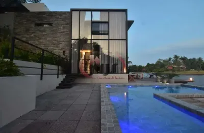 Casa a venda parque encontro das águas na beira da lagoa vista excepcional