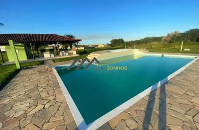 Apartamento em condomínio pé na areia em iguaba grande -rj