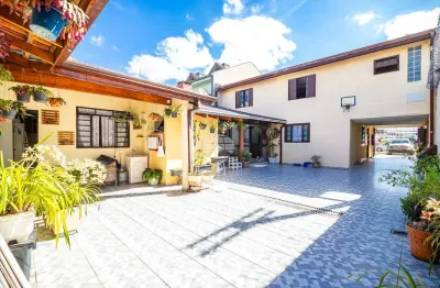 Casa com 4 quartos à venda na rua miguel josé grein, 41, xaxim, curitiba, 300 m2 por r$ 950.000