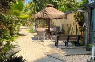 Casa com 3 quartos à venda na Rua Papoula, Camburi, São Sebastião