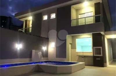 Casa com 3 quartos à venda na Rua Carimbo, Tupi, Praia Grande