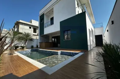 Residência exclusiva com 4 suítes e área de lazer completa!