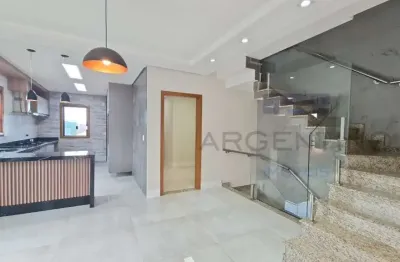 Sobrado com sauna, piscina, espaço gourmet e mirante a venda condomínio fechado.