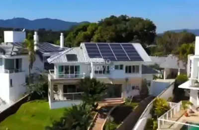 Casa em condomínio fechado com 3 quartos à venda na rodovia haroldo soares glavan, 345, cacupé, florianópolis por r$ 7.500.000
