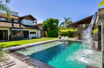 Casa em condomínio fechado com 4 quartos à venda na rodovia doutor antônio luiz moura gonzaga, 647, rio tavares, florianópolis por r$ 6.000.000