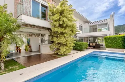 Casa em condomínio fechado com 4 quartos à venda na rua mário avancini, 61, lagoa da conceição, florianópolis por r$ 5.500.000