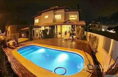 Casa em condomínio fechado com 4 quartos à venda na rua jorge amado, 82, lagoa da conceição, florianópolis por r$ 3.350.000