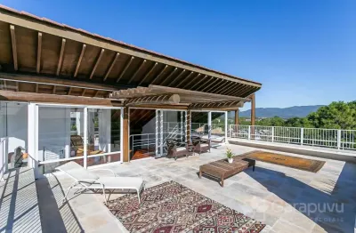 Casa em condomínio fechado com 6 quartos à venda na Rodovia Jornalista Manoel de Menezes, 2129, Barra da Lagoa, Florianópolis