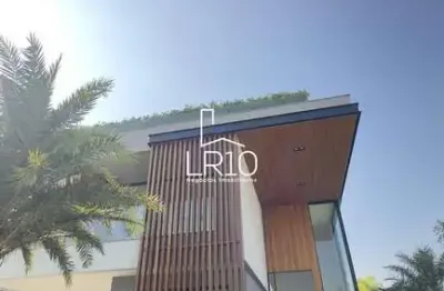 Casa triplex com 5 suítes condominio das mansões na barra da tijuca
